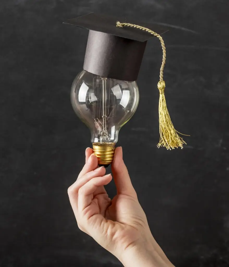 Hand holding a light bulb, a new idea